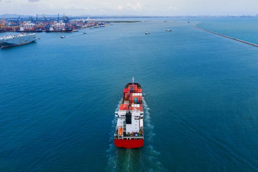 Aerial view of container cargo ship in sea.