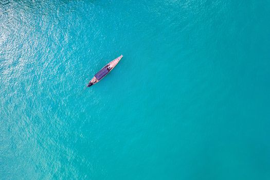 Aerial view of long tail boat on ocean, Thailand.