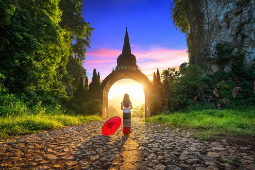 Woman standing at Khao Na Nai Luang Dharma Park in Surat Thani, Thailand