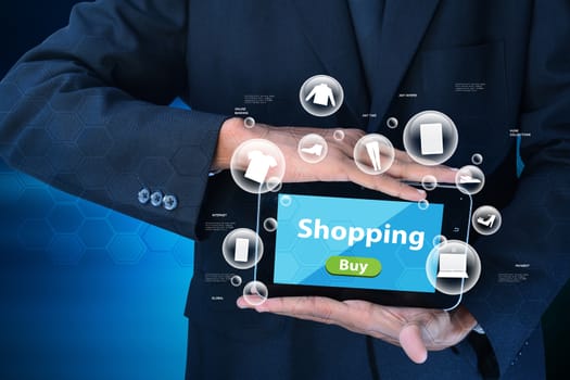 Business man showing Online shopping concept in color background