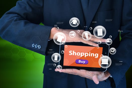 Business man showing Online shopping concept in color background