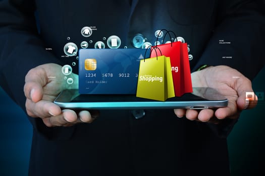 Business man showing Online shopping concept in color background