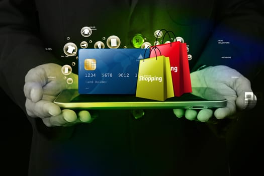 Business man showing Online shopping concept in color background