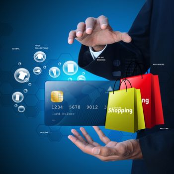Business man showing Online shopping concept in color background