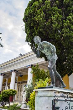 Achilleion palace, Corfu, Greece - August 24, 2018: Bronze runner on Achilleion palace of princess Sissy in Corfu, Greece