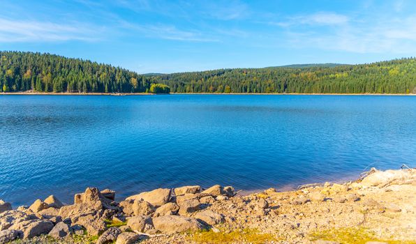 Mountain water reservoir Josefuv Dul, aka Josefodolska Dam, Jizera Mountains, Czech Republic. Sunny summer day.