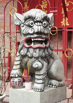 Marble lion at the entrance of a temple, Vietnam