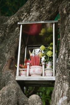 Small box with incence and offerings to gods, Vietnam