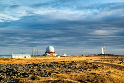 Radar station in Vestrahorn at sunset in a cloudy day, Iceland