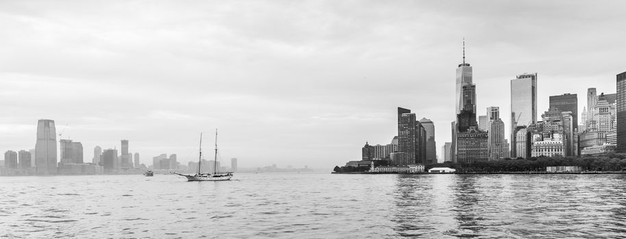 Panoramic view of Lower Manhattan and Jersey City, New York City, USA. Black and white image.