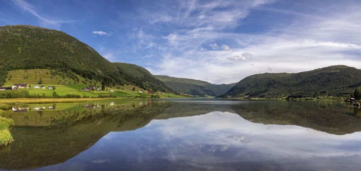 Panoramic view over lake Dalavatnet near the Norwegian town Sogndal on a clear and crisp day