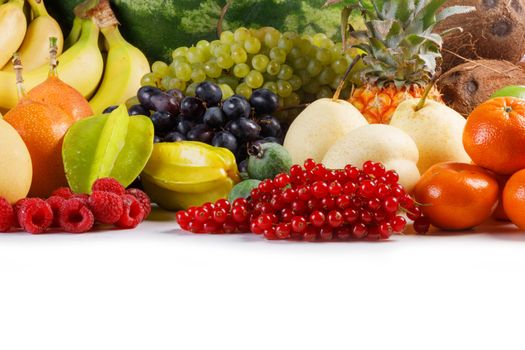 Fresh tropical fruits harvest pile isolated on white background with copy space for text