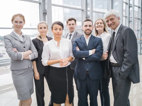 Portrait business people team , office staff standing in lobby