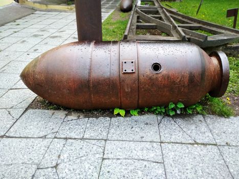 
A huge bomb rusty color of in horizontal position large plan.