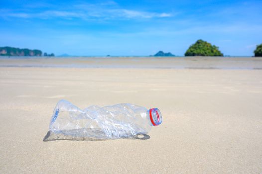 garbage the beach sea plastic bottle lies on the beach and pollutes the sea and the life of marine life Spilled garbage on the beach of the big city. Empty used dirty plastic bottles