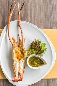 Grilled mighty tiger river prawn with spicy sauce and lettuce