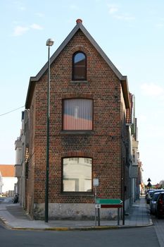 The gable of a house built of bricks  Der Giebel eines  aus Klinkern gebauten Hauses