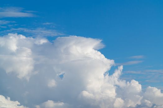 beautiful white cumulus clouds in the blue sky during the day.