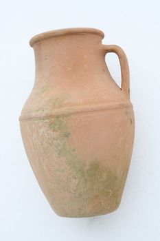 Terracotta amphora lying on a white background  liegende Terrakotta Amphore auf wei�em Hintergrund  