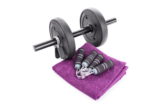 Dumbbell, hand grips and a towel, isolated on white background.