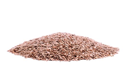 Heap of flax seeds isolated on white background.