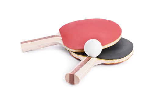 Close-up shot of ping-pong bats with a ball, isolated on white background.