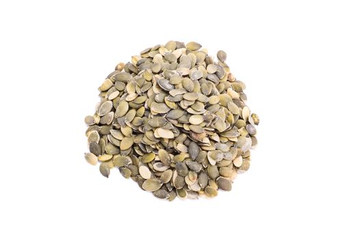 Top perspective of a heap of pumpkin seeds, isolated on white background.