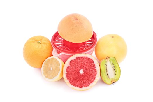 Squeezer and different fruits, isolated on white background. Orange, grapefruit, lemon and kiwi with a juice squeezer, isolated on white background.