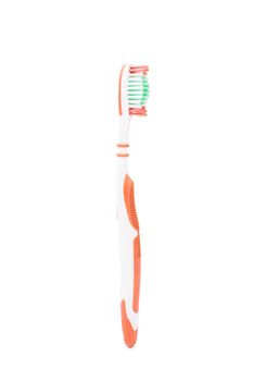 Close-up shot of a vertically placed toothbrush, isolated on white background.