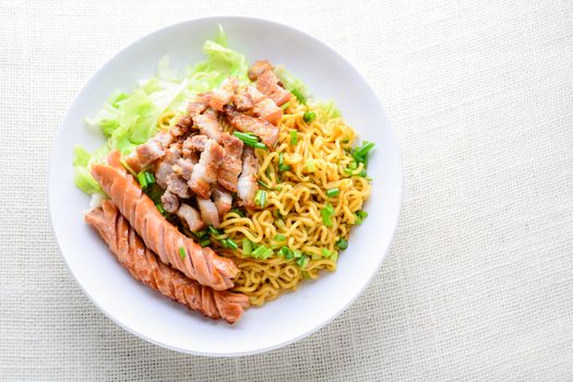 Udon noodles with grilled pork, sausage and cabbage - Japanese cuisine
