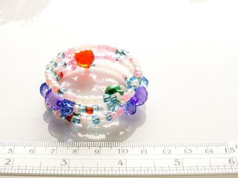 Multi-colored bracelets with beads. Colourful child's bead bracelet.
