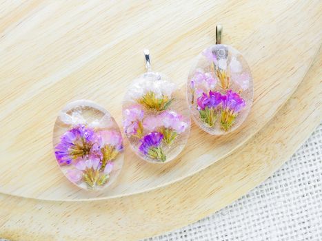 Dried flower in crystal clear resin pendant necklace, pendant with a real flowers. 
