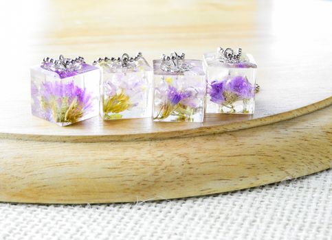 Dried flower in crystal clear resin pendant necklace, pendant with a real flowers. 
