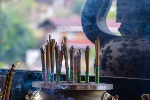 Incense stick joss sticks at buddhist temple