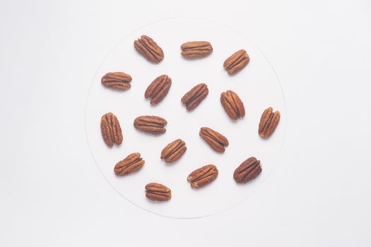 Pecan nuts isolated on white backgroud. 