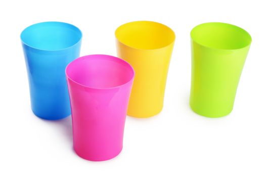 Plastic colorful cups isolated on white background