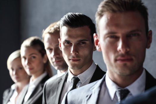 Group of business people standing in a row
