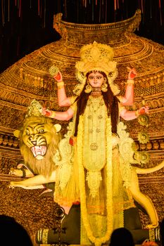 Kolkata West Bengal India October 2018 - Image of goddess devi Maa Durga or Parvati or Uma, wife of Lord Shiva in jewelery and Ceremonial make up during famous Durga Puja (Durgotsava) annual festival.