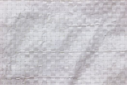 Texture and Wrinkles of white plastic net bag. Concept of recycle product or global warming.