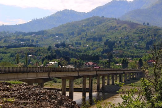 Bridge over the Chorokhi River, view of the village of Makho, Georgia, Adjara, spring