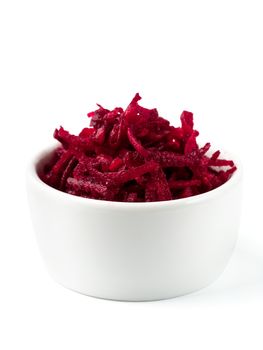 Grated beetroot in ceramic bowl. Shredded beet root salad isolated on white