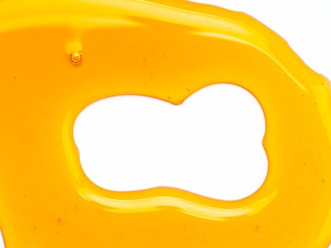 Abstract pattern from honey. Can use for design. Copy space for text. Honey background isolated on white with clipping path.