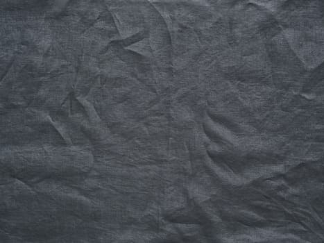 Gray linen texture as background. Gray linen crumpled tablecloth. Can use as mock up for design. Copy space for text