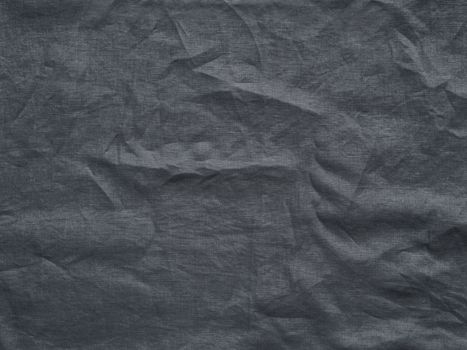 Gray linen texture as background. Gray linen crumpled tablecloth. Can use as mock up for design. Copy space for text