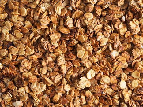 Organic homemade Granola Cereal with oats and almond. Texture oatmeal granola or muesli as background. Top view or flat-lay. Copy space for text.