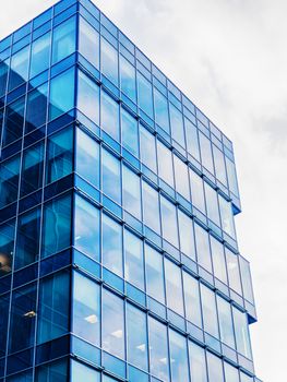 Modern building exterior with copy space. Modern office building with facade of glass.