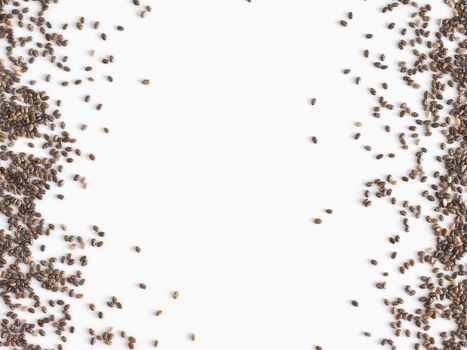 Chia seeds with copy space. Isolated on white. Top view or flat lay. Healthy food and diet concept