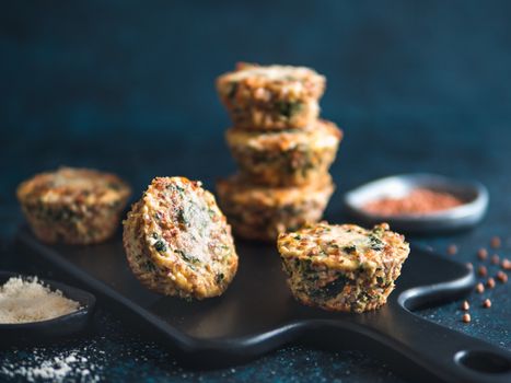 Buckwheat casserole with spinach,carrot,parmesan cheese.Baked eggs with buckwheat,vegetables and cheese.Ideas and recipes healthy easy breakfast,lunch,kids meal,snack - vegetables muffins.Copy space