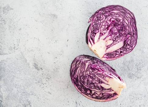 red cabbage on gray cement background. Top view of red cabbage on gray table with copy space for text. Background for healthy eat, vegetarian meny
