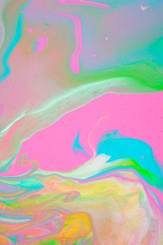 Painting in bright pastel colors using liquid fluid art trendy technique. Flat lay. Close-up. Concept contemporary art accessible to everyone. Vertical.